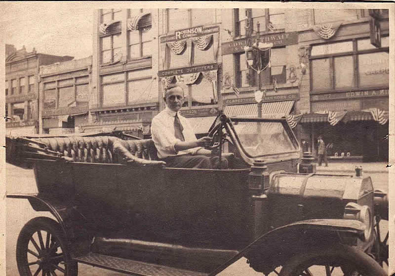 73 Market Street
Photo from Lynn Lipton
This is a 1920 view from the front of 78 Market Street of Julius Chasen in a car.  Robinson Company is across the street at 73 Market Street.
